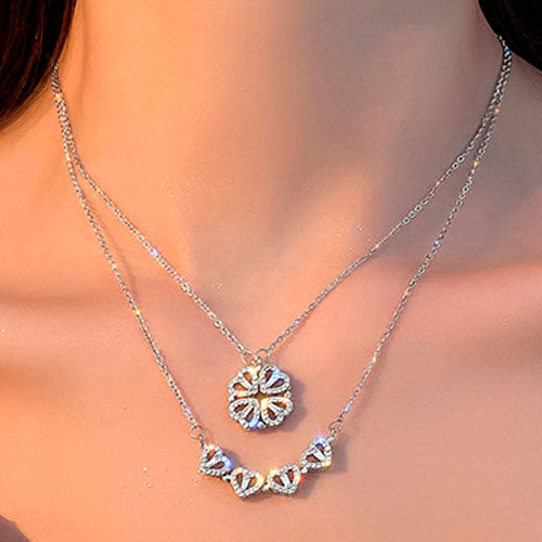 Glücksblumen Magnet Kette in Gold mit Glitzersteinen - stilvolles Schmuckstück für positive Energie und Eleganz