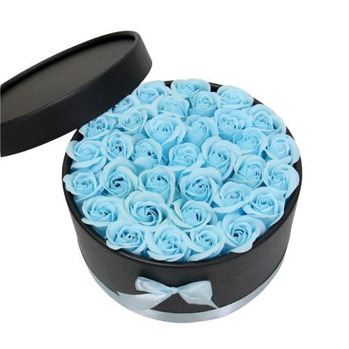 Exquisite Dekobox mit kunstvoll gefertigten blauen Seidenrosen in elegantem Design